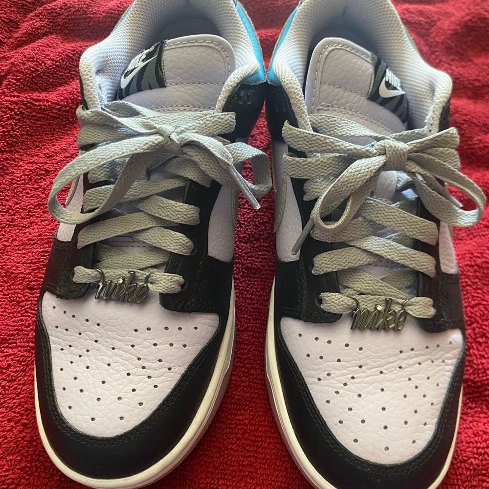 Custom designed Lavender, blue, black and Gray Nike sneakers.